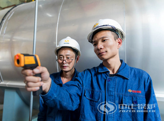 永乐高锅炉手艺团队对自然气热水锅炉在做全方面检测事情