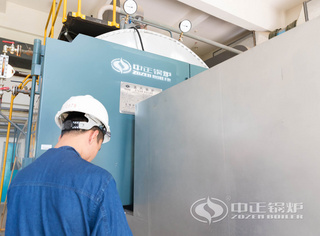 永乐高锅炉效劳职员认真检查燃气锅炉