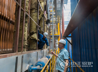 永乐高锅炉售后职员与用户举行相同交流