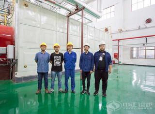 永乐高锅炉手艺职员与北方化学事情职员合影