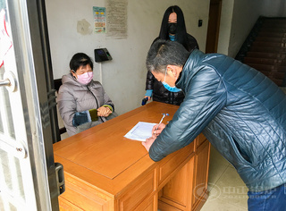 永乐高锅炉接受体温丈量并举行康健挂号