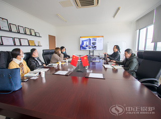 陆星副总司理为客户先容永乐高锅炉先进机械装备