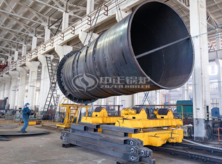 吊装到翻转架准备装配的锅炉本体
