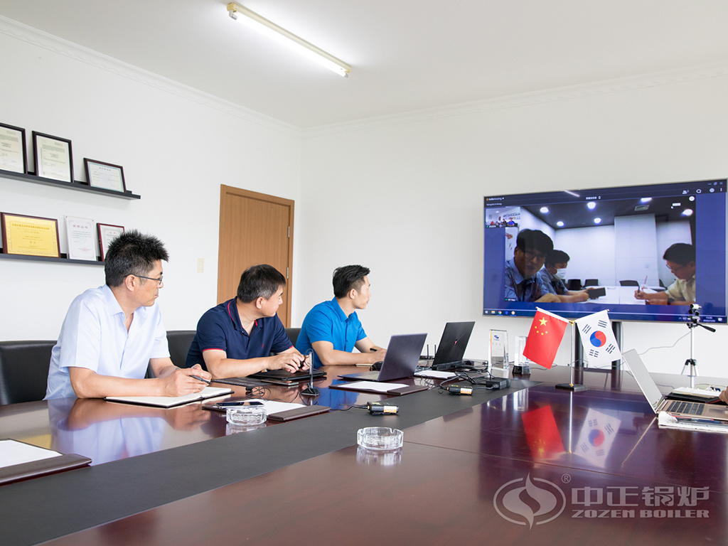 中正锅炉与会人员与韩国客户通过视频会议沟通双发需求