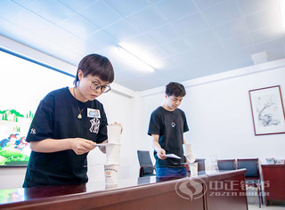 永乐高锅炉团建活动抽纸杯环节