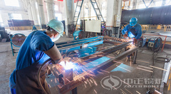 永乐高锅炉钢管省煤器生产之翅片管组装