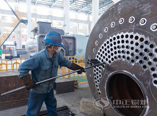 永乐高WNS系列燃油燃气锅炉穿烟管工序